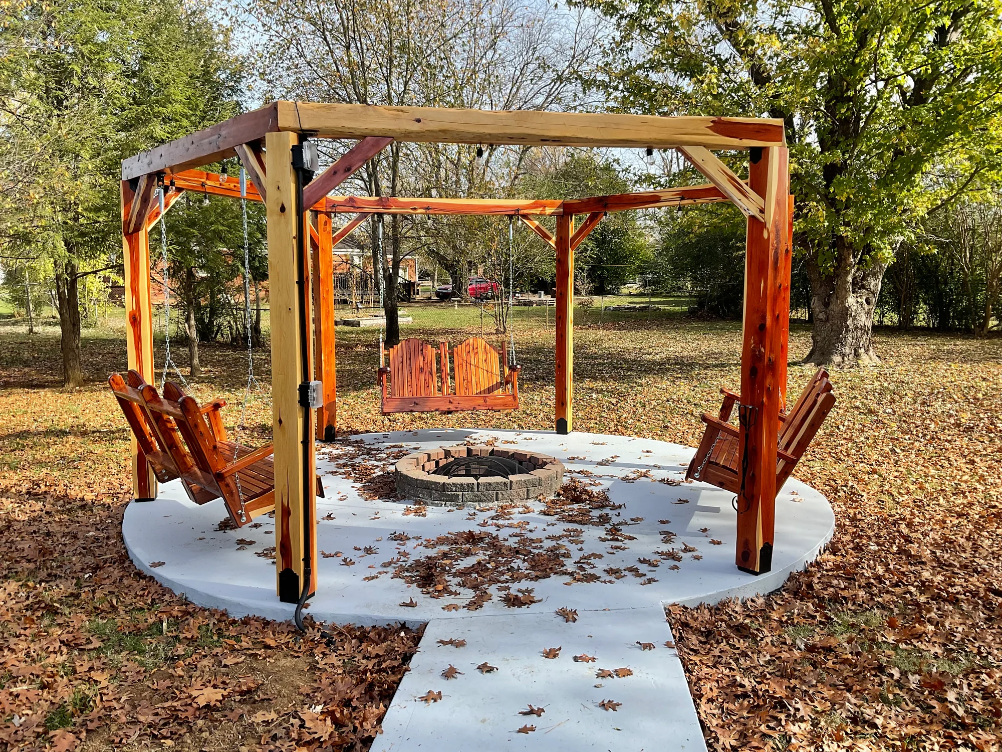 Timber outdoor structure in a wooded setting